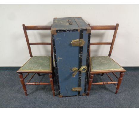 An early 20th century metal bound travelling trunk together with a pair of Edwardian bedroom chairs 