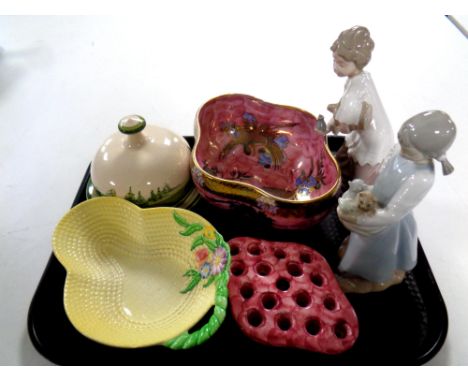 A tray containing a Maling lustre bowl decorated in oriental style depicting storks, with flower holder, together with a Carl