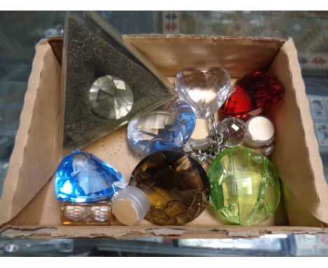A quantity of Swarovski crystal pendants, stones, miniature egg timer 