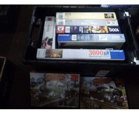 A TRAY OF JIGSAW PUZZLES TO INCLUDE J. R. RAVENSBURGER, SCHMIDT, ETC.