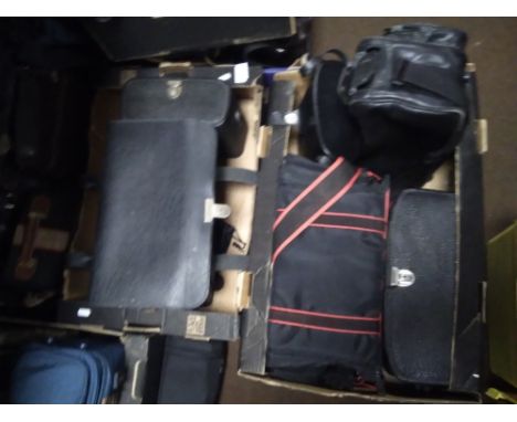 SEVEN TRAYS OF CAMERA CASES AND BINOCULARS CASES (TRAYS NOT INCLUDED)
