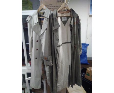 A BURBERRY JACKET TOGETHER WITH AN AQUASCUTUM JACKETThe coats are both female in used condition with light marks and moderate