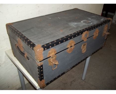A VINTAGE TRAVEL TRUNK