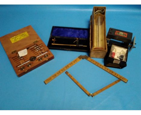 A COLLECTION OF VINTAGE TOOLS, WOODEN RULERS, LARGE MAGNET ETC