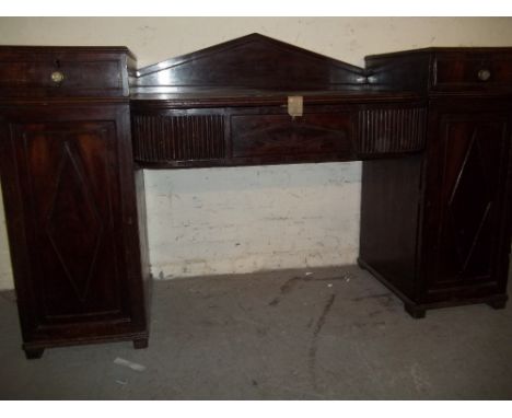 AN ANTIQUE TWIN PEDESTAL MAHOGANY DESK