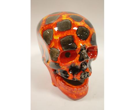 A LARGE SIGNED ANITA HARRIS HOT COALS PATTERN CERAMIC SKULL