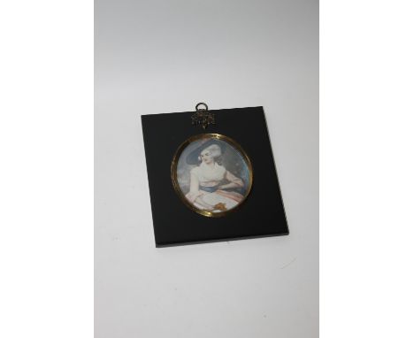 A SIGNED MINIATURE OVAL PORTRAIT OF A LADY 