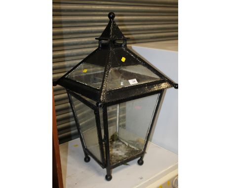 A VINTAGE CAST METAL LANTERN