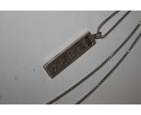 A HALLMARKED SILVER INGOT ON CHAIN 