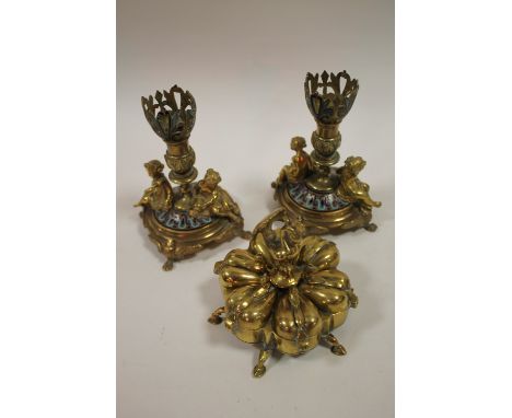 A PAIR OF ORNATE BRASS AND ENAMEL FIGURATIVE CANDLESTICKS TOGETHER WITH A SIX FOLD SERVER? WITH BIRD DETAIL (3) 