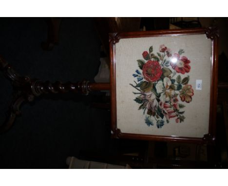 A 19TH CENTURY POLE SCREEN, the rectangular glazed screen with floral needlepoint detail, the lower section of the pole of ba