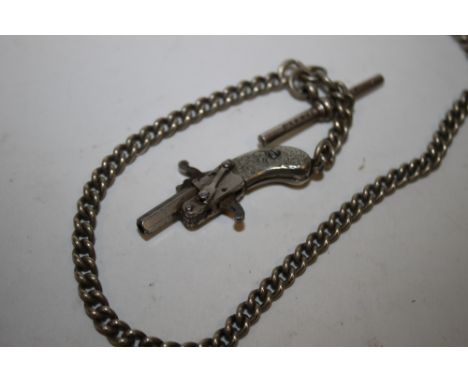 AN ANTIQUE ALBERT WATCH CHAIN WITH NOVELTY PISTOL FOB