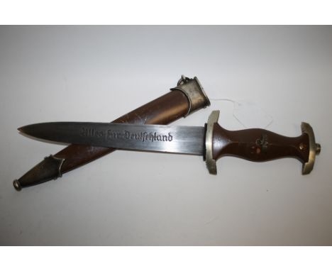A NAZI STYLE ARMY DAGGER IN BROWN SCABBARD, inscribed on blade 'Alles fur Deutschland' and 'Rich Abr Herder, Berlin', blade L