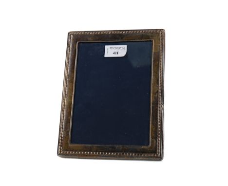 ELIZABETH II SILVER PHOTOGRAPH FRAME, maker Carr's, Sheffield 1992, the oblong frame with rope twist border, easel backed sup