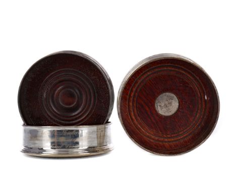PAIR OF SILVER WINE SLIDES, maker K M Silver, Birmingham 1995, each of circular form with turned base, presentation inscripti