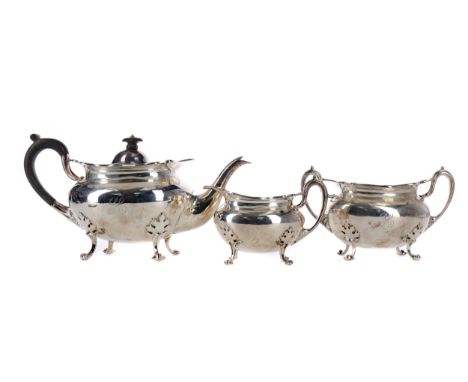 EDWARDIAN SCOTTISH SILVER THREE PIECE TEA SERVICE, likely maker James Weir, Glasgow 1909, comprising teapot, cream and sugar,