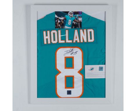 This framed and autographed Miami Dolphins jersey features the signature of Jevon Holland (#8), one of the team's standout de