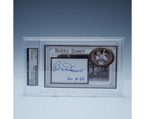 This lot includes two PSA-certified collectibles celebrating baseball Hall of Famer Bobby Doerr. The first item is a Hall of 
