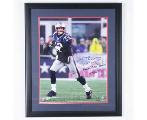 A framed, authenticated autographed photo of Tom Brady from his final game as a New England Patriot on January 4, 2020. This 