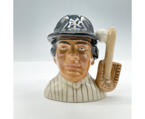 Miniature character jug of a New York Yankees player. White baseball, baseball glove, and bat as the handle. Marked: Royal Do
