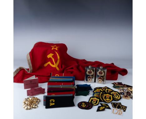 This extensive collection of Soviet-era memorabilia offers a comprehensive look into the history and symbolism of the USSR. T