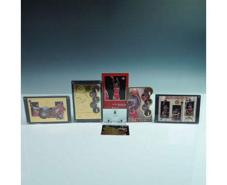 A remarkable collection of six Upper Deck collectible cards honoring the legendary Michael Jordan, commemorating key moments 