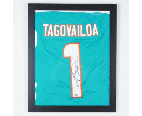 This framed and autographed Miami Dolphins jersey features the signature of Tua Tagovailoa (#1), the team's star quarterback 