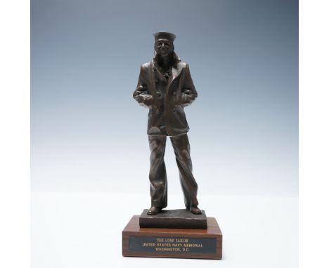 This bronze resin sculpture titled The Lone Sailor is a miniature version of the iconic figure located at the United States N
