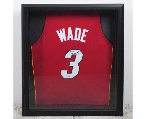 This framed and autographed Miami Heat jersey features the signature of Dwyane Wade (#3), a three-time NBA champion and one o