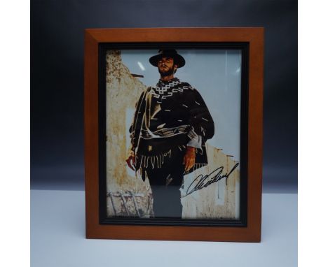 An 8x10 color photograph of Clint Eastwood in his iconic role as The Man with No Name from the classic spaghetti western The 