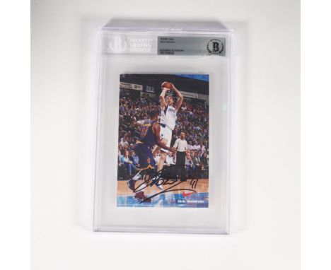 An outstanding collectible for basketball enthusiasts, this Dirk Nowitzki signed promo card captures the legendary Dallas Mav