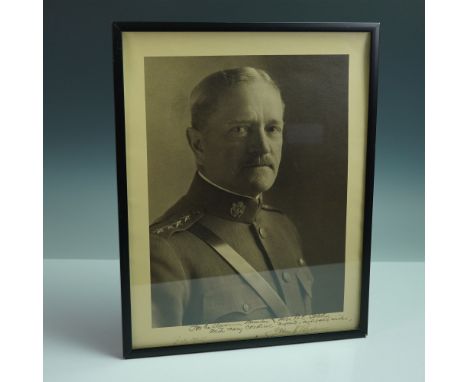 A sepia-toned photographic portrait of General John J. Pershing, inscribed and signed in ink below the image: "For the Americ