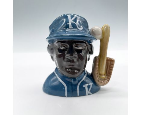 Miniature character jug of a Black Kansas City Royals player. White baseball, baseball glove, and bat as the handle. Marked: 
