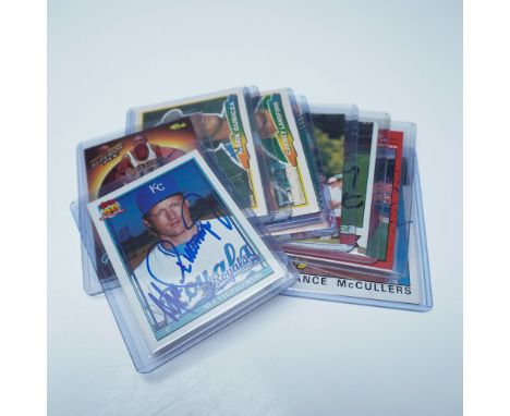 A remarkable collection of 10 autographed baseball cards featuring legendary players and fan-favorite stars. This selection i