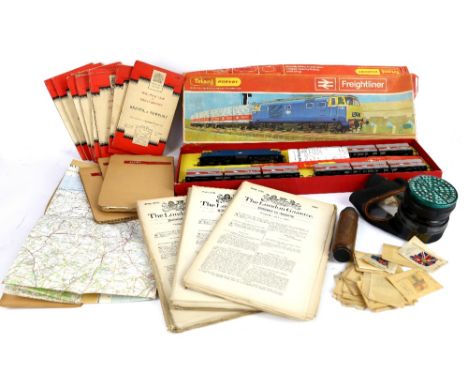 Two gas masks, Ordnance survey maps, Hornby Freightliner boxed set.      