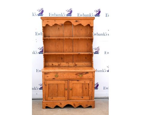 Victorian pine dresser, with shelves above single long drawer and two cupboard doors on bracket feet with shaped apron, H179 