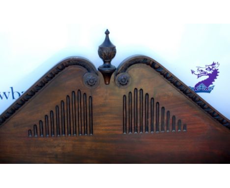 Stained Oak four poster bed in a gothic style with carved details and finial..      