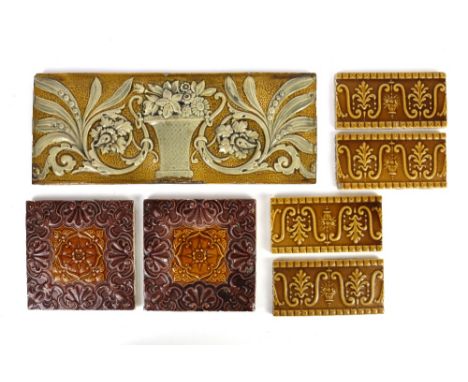 Various ceramic fire surround tiles, the largest marked for Burmantoft verso.      