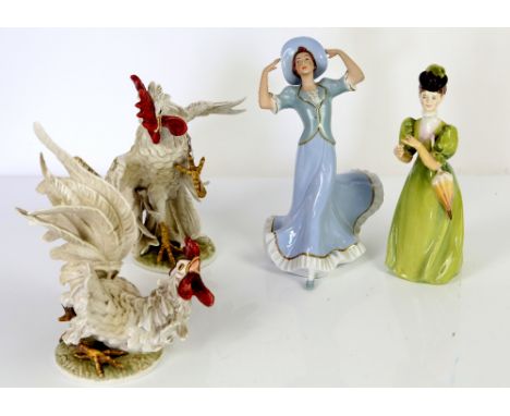 Goebel fighting roosters, CM113 and CV114, a Royal Dux figurine, and a Francesca Art China figurine (4 in lot).      