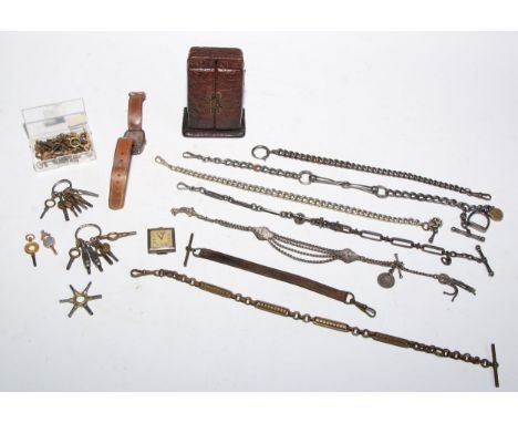 A 19th century brass pocket watch chain; other 19th century base metal pocket watch chains; assorted pocket watch keys; a sil