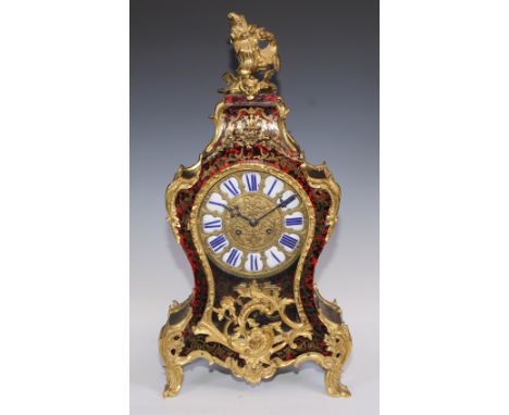 A 19th century French gilt metal mounted boulle cartouche shaped bracket clock, 15cm circular dial inscribed with Roman numer