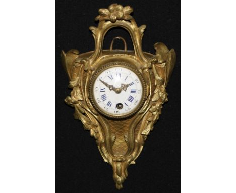 A 19th century French ormolu cartel timepiece, 7cm convex enamel clock dial inscribed with Roman and subsidiary Arabic numera