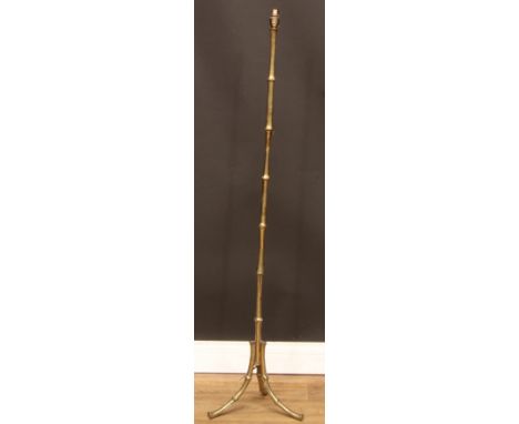 A brass tripod floor lamp, naturalistically cast as bamboo, 132.5cm high over fitting 