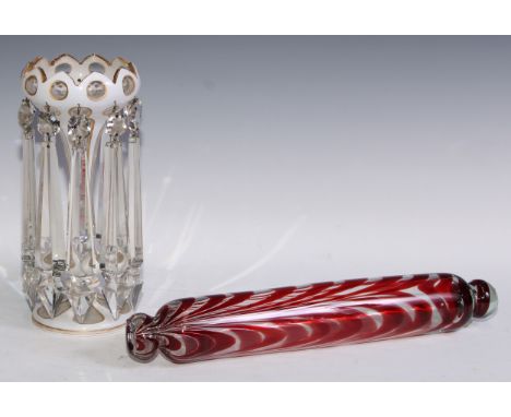 A Victorian lustre, overlaid in white, prismatic clear glass lutres, 25cm high, c.1890;  a Nailsea glass rolling pin, combed 