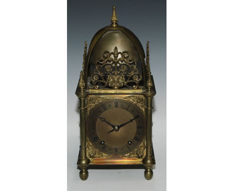 A 17th century style brass lantern clock, 14.5cm chapter ring engraved with Roman and subsidiary Arabic numerals, twin windin