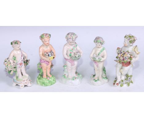 A Derby patch mark figure, Spring, modelled as a putto garlanded with flowers and holding a nest of hatchlings, 15cm high, c.