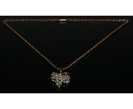 A Victorian style seed pearl and gold coloured metal pendant as a bunch of white grapes, 9ct gold chain, 7.9 gross 