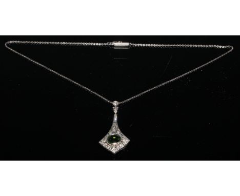 An Art Deco diamond and demantoid garnet pendant necklace, central round cut deep green garnet collar set within pave diamond