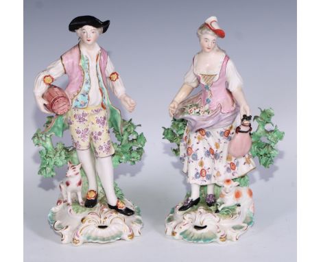A pair of Derby patch mark figures, of a beau and his lady, pierced scroll bases, he stands 26cm high, c.1770 