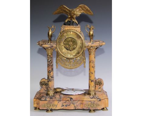 A late 19th century French veined yellow marble portico mantel timepiece, circular enamel dial with Arabic numerals, twin win